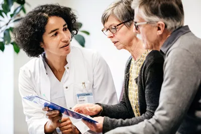 photo of doctor giving results to patients