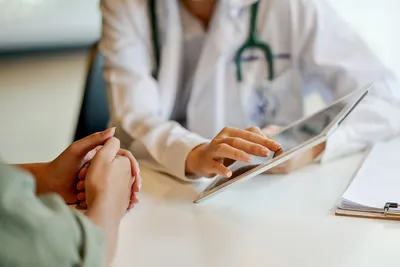photo of doctor patient consultation