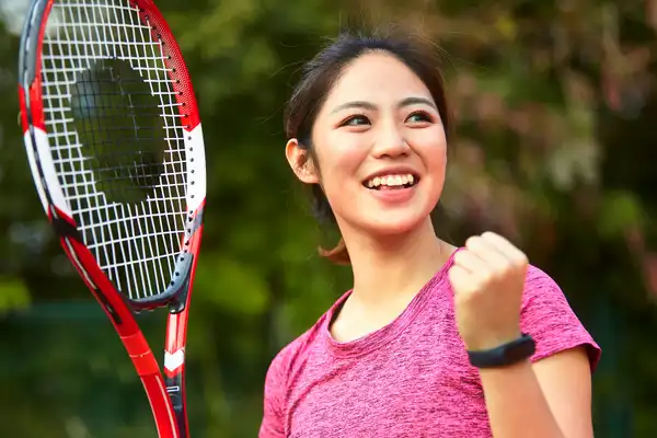 photo of woman playing tennis