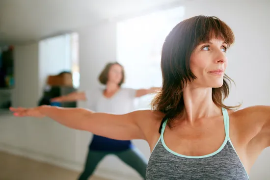 photo of woman doing yoga