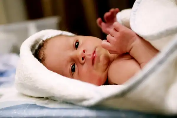 newborn baby on towel