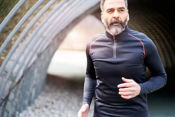 photo of mature man jogging