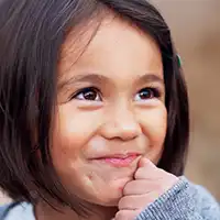 photo of young girl smiling